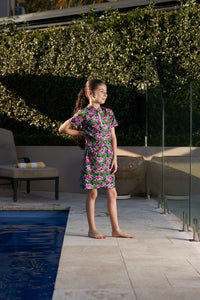 Midnight Bloom print in a rash t-shirt and skort